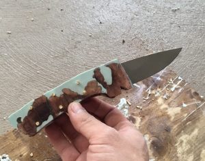 rough knife handle with brass pins