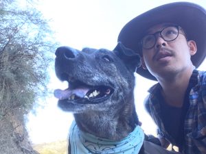 wearing stetson hat with dog