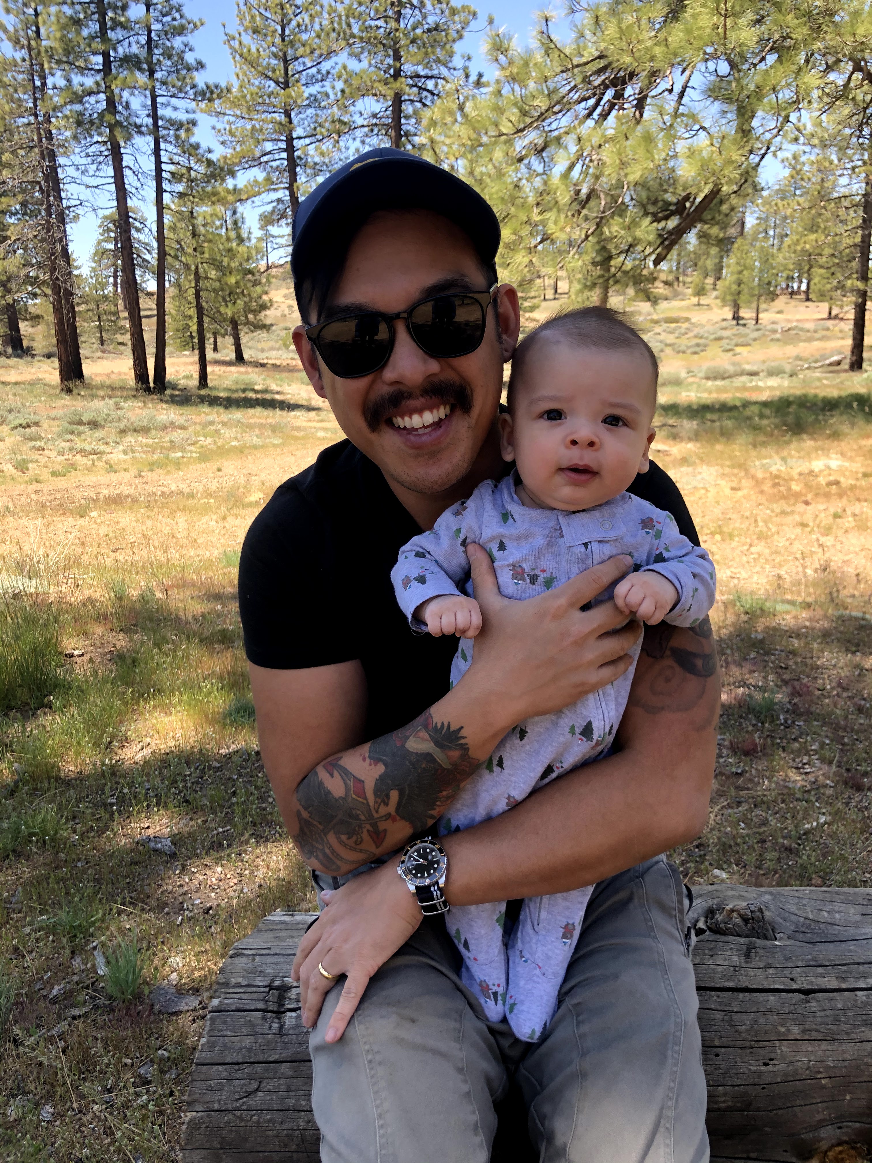 dad and baby outdoor camping